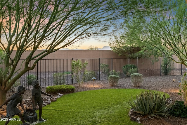 16987 W Princeton Ave, Goodyear, AZ 85395 - view of yard at dusk