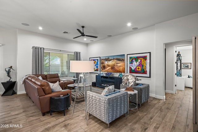 16987 W Princeton Ave, Goodyear, AZ 85395 - living room featuring wood finished floors, ceiling fan, and recessed lighting