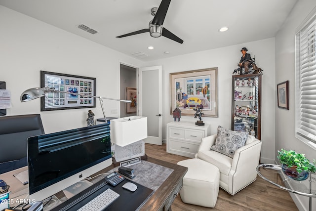 16987 W Princeton Ave, Goodyear, AZ 85395 - home office with wood finished floors, ceiling fan, and recessed lighting