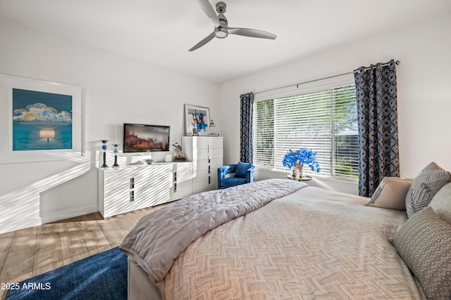 16987 W Princeton Ave, Goodyear, AZ 85395 - bedroom with a ceiling fan and baseboards