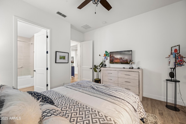 16987 W Princeton Ave, Goodyear, AZ 85395 - bedroom featuring wood finished floors, ensuite bath, and ceiling fan