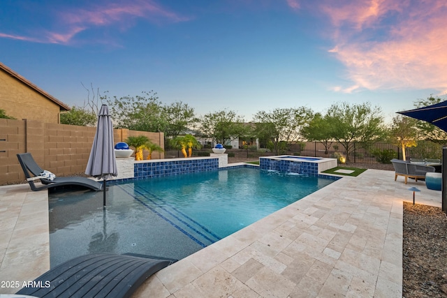 16987 W Princeton Ave, Goodyear, AZ 85395 - view of pool featuring an in-ground hot tub, a patio area, and a fenced backyard