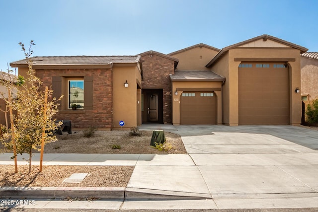 view of front of property with a garage