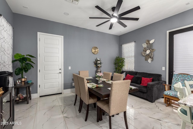 dining area featuring ceiling fan