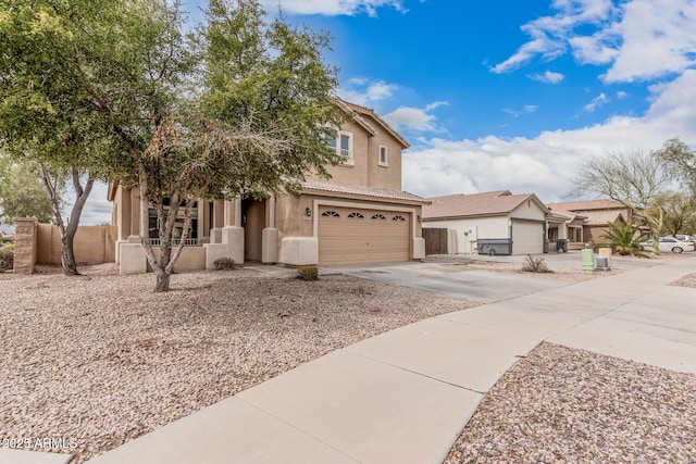 22337 E Via Del Palo, Queen Creek, AZ 85142 - view of front of house with concrete driveway, stucco siding, fence, an attached garage, and a tiled roof