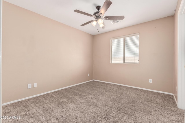 22337 E Via Del Palo, Queen Creek, AZ 85142 - carpeted spare room with baseboards, ceiling fan, and visible vents