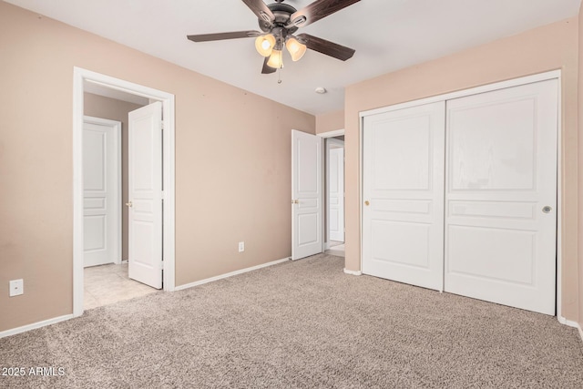 22337 E Via Del Palo, Queen Creek, AZ 85142 - unfurnished bedroom featuring baseboards, a closet, and light colored carpet