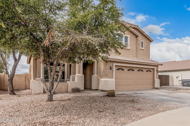 22337 E Via Del Palo, Queen Creek, AZ 85142 - view of front of house with fence, a tiled roof, a garage, concrete driveway, and stucco siding