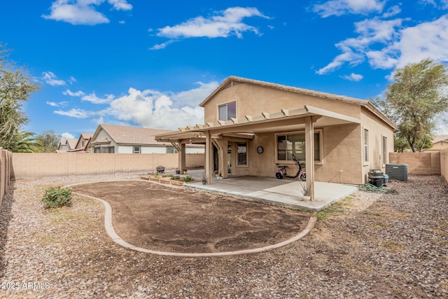 22337 E Via Del Palo, Queen Creek, AZ 85142 - back of property with a fenced backyard, cooling unit, stucco siding, and a patio area