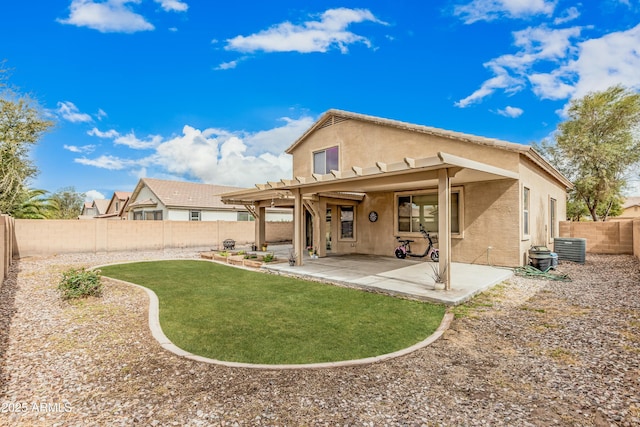 22337 E Via Del Palo, Queen Creek, AZ 85142 - back of property with stucco siding, a patio, a fenced backyard, central AC, and a yard