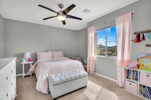 bedroom with baseboards, visible vents, ceiling fan, and light colored carpet