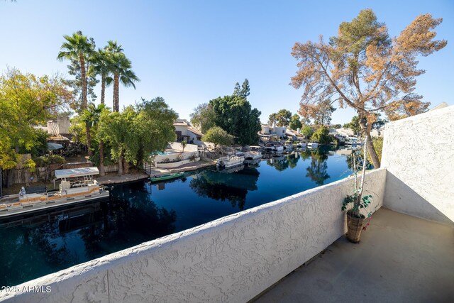 view of pool featuring a water view