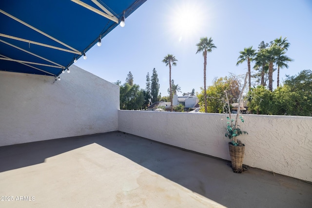 view of patio / terrace featuring a balcony