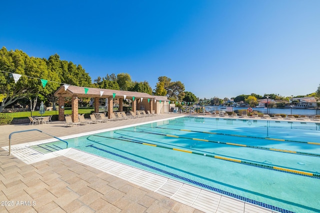 view of swimming pool featuring a patio area