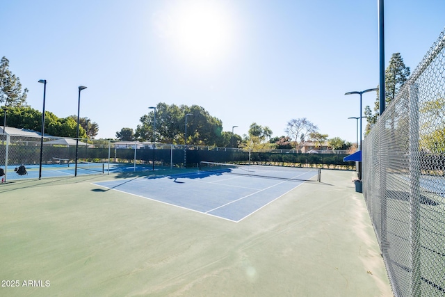 view of sport court featuring basketball court