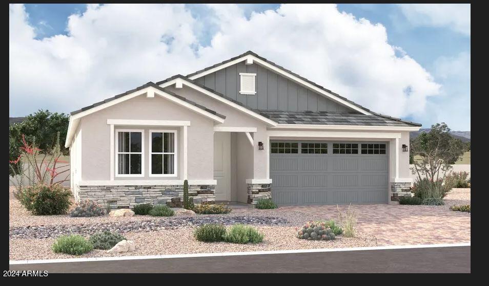 craftsman-style home with a garage