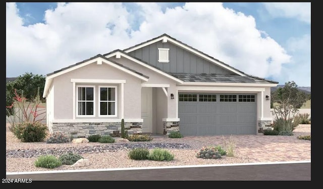 craftsman-style home with a garage