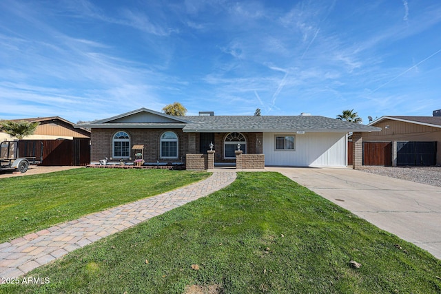 ranch-style house featuring a front lawn