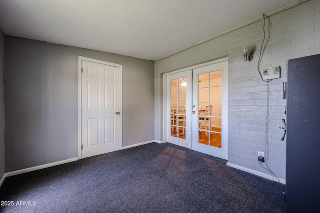 interior space with french doors and dark colored carpet