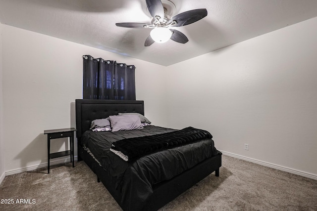 bedroom with ceiling fan and carpet