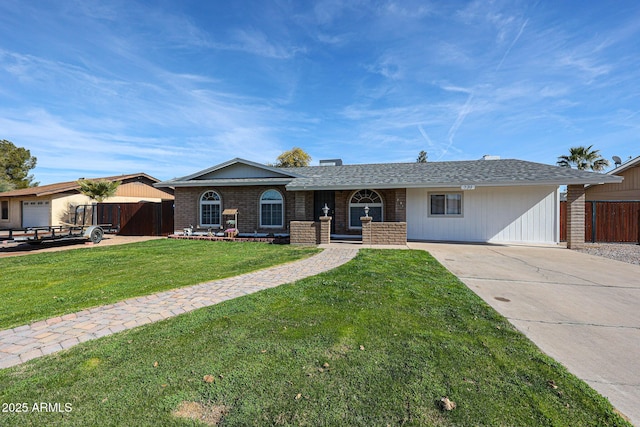 single story home with a garage, covered porch, and a front yard