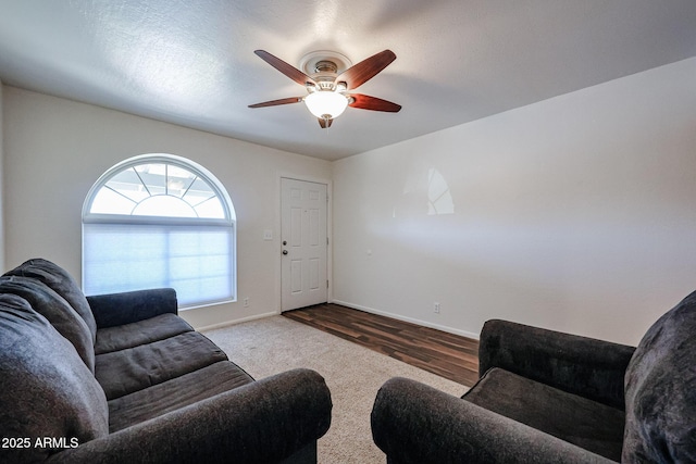 living room featuring ceiling fan