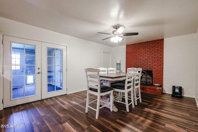 dining area with dark wood-type flooring, french doors, and ceiling fan