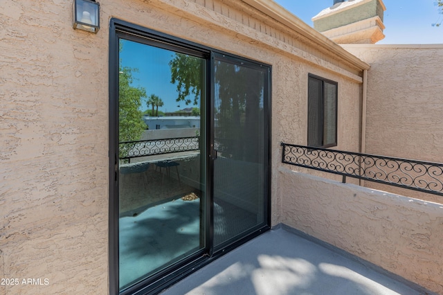 2935 N 68th St Unit 205, Scottsdale, AZ 85251 - view of exterior entry featuring stucco siding