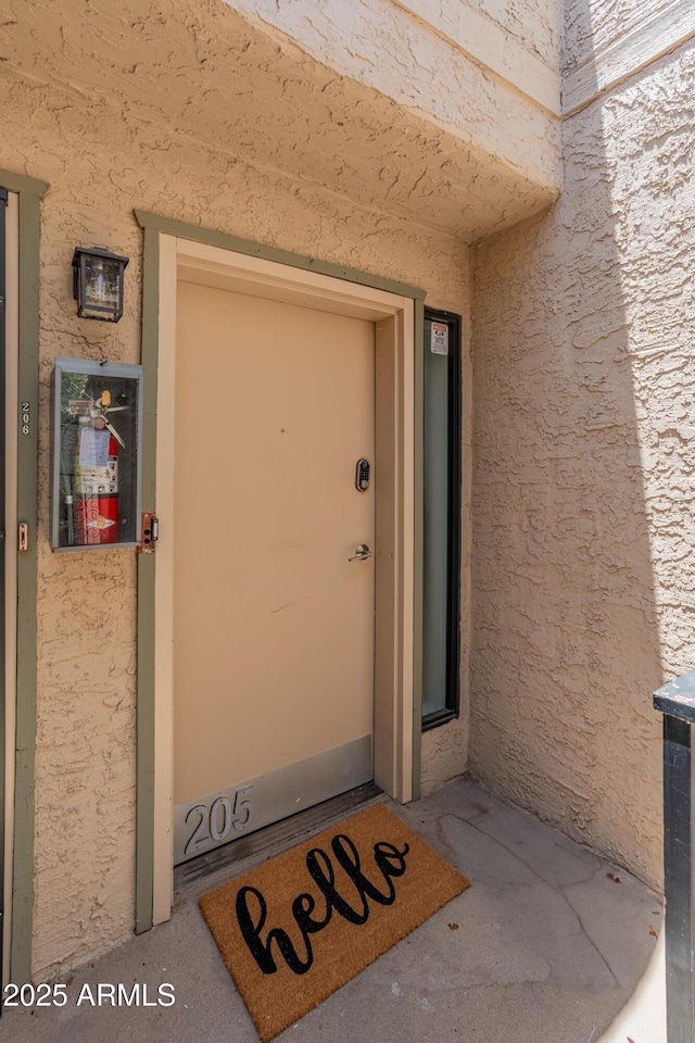 2935 N 68th St Unit 205, Scottsdale, AZ 85251 - view of exterior entry featuring stucco siding