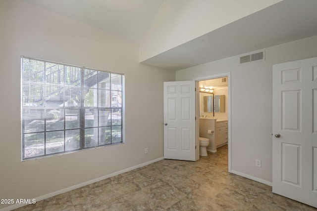 2333 E Southern Ave Unit 1023, Tempe, AZ 85282 - unfurnished bedroom featuring lofted ceiling and ensuite bath