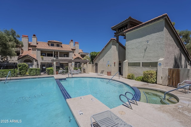 2333 E Southern Ave Unit 1023, Tempe, AZ 85282 - view of swimming pool featuring a patio and a pool with connected hot tub
