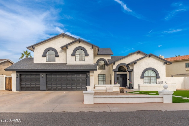 view of front of property with a garage