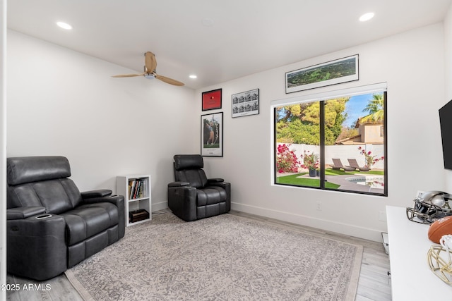 interior space featuring ceiling fan and light wood-type flooring