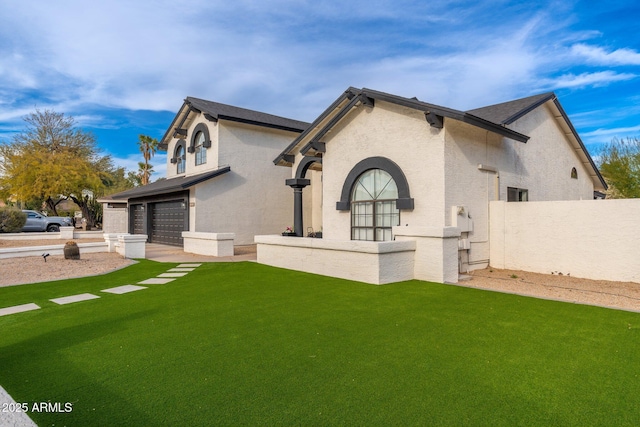 exterior space featuring a yard and a garage