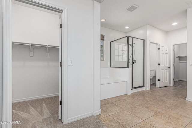interior space with recessed lighting, visible vents, and baseboards