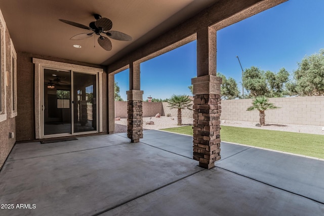 view of patio featuring a fenced backyard and ceiling fan