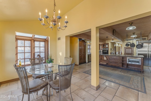 dining space with high vaulted ceiling, baseboards, visible vents, and a chandelier