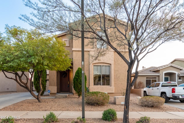 view of front of property featuring stucco siding