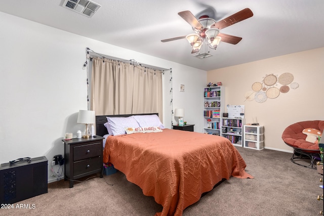 bedroom featuring baseboards, visible vents, ceiling fan, and carpet flooring