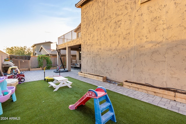 exterior space featuring a patio area and fence