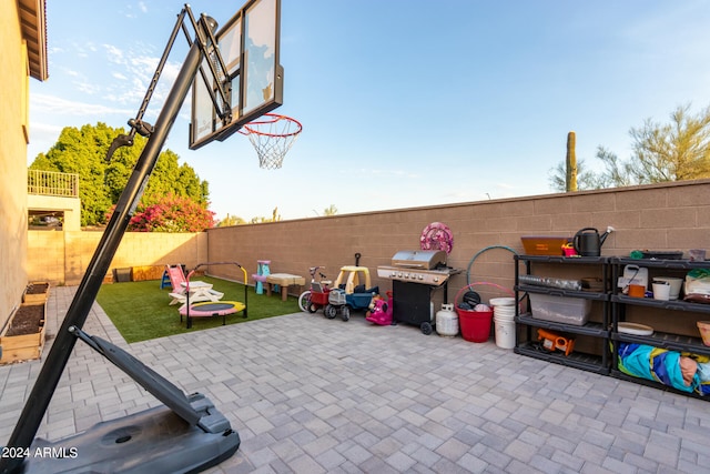 view of patio featuring area for grilling and a fenced backyard