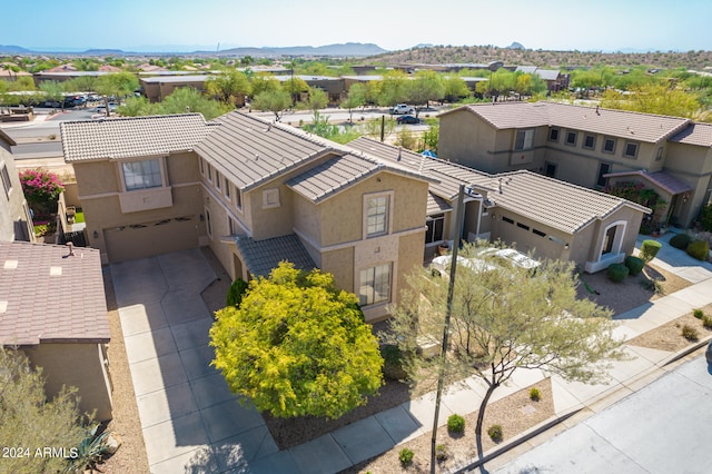 birds eye view of property featuring a residential view and a mountain view