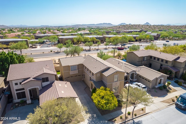 birds eye view of property with a residential view and a mountain view