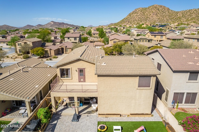 birds eye view of property featuring a residential view and a mountain view