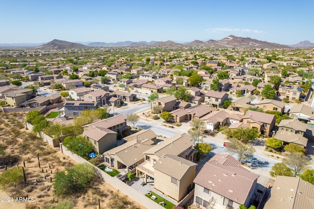 drone / aerial view featuring a mountain view and a residential view