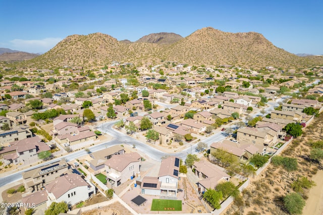 birds eye view of property featuring a mountain view and a residential view