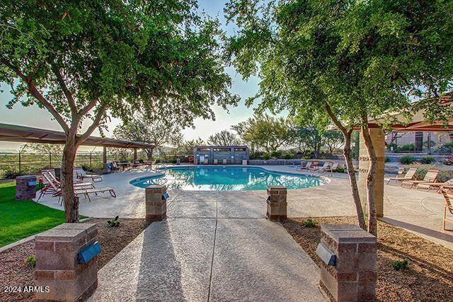 pool with a patio area