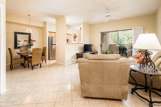 14950 W Mountain View Blvd Unit 7209, Surprise, AZ 85374 - living room featuring light tile patterned floors, baseboards, and ceiling fan