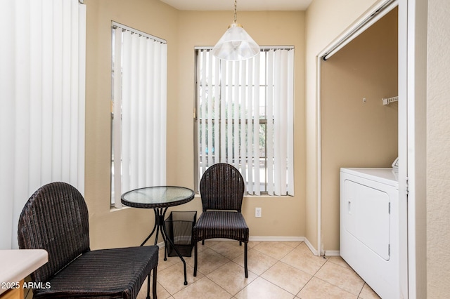 14950 W Mountain View Blvd Unit 7209, Surprise, AZ 85374 - sitting room featuring washer / dryer, baseboards, and light tile patterned flooring