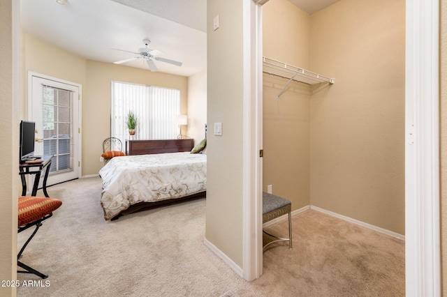 14950 W Mountain View Blvd Unit 7209, Surprise, AZ 85374 - carpeted bedroom with baseboards, access to exterior, and ceiling fan